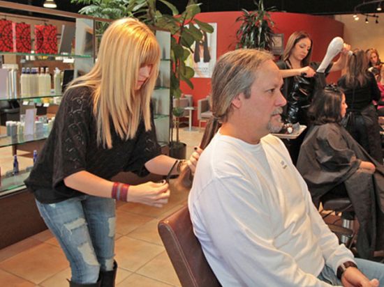 Dr. Nelson gets his hair cut for Locks for Love
