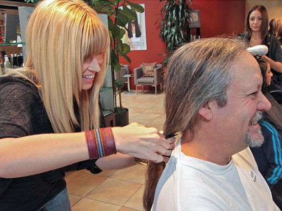 Dr. Nelson gets his hair cut for Locks for Love